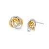 Thumbnail Image 0 of Italian Gold 0.20 CT. T.W. Diamond Knot Stud Earrings in 18K Two-Toned Gold