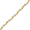 Thumbnail Image 1 of 0.15 CT. T.W. Diamond Wave Link Alternating Bracelet in 10K Gold