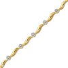 Thumbnail Image 0 of 0.15 CT. T.W. Diamond Wave Link Alternating Bracelet in 10K Gold