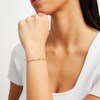 Thumbnail Image 2 of 0.15 CT. T.W. Diamond Wave Link Alternating Bracelet in 10K Gold