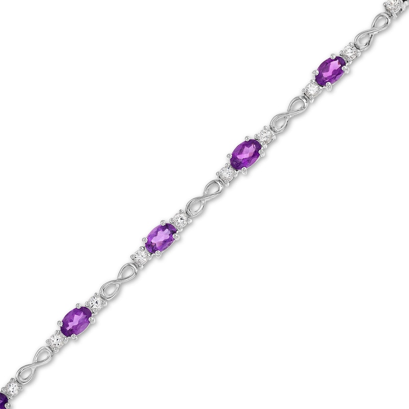 Main Image 1 of Oval Amethyst and White Lab-Created Sapphire Alternating Infinity Line Bracelet in Sterling Silver - 7.25"