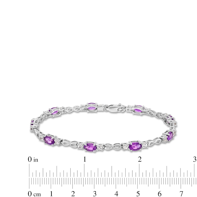 Main Image 4 of Oval Amethyst and White Lab-Created Sapphire Alternating Infinity Line Bracelet in Sterling Silver - 7.25"
