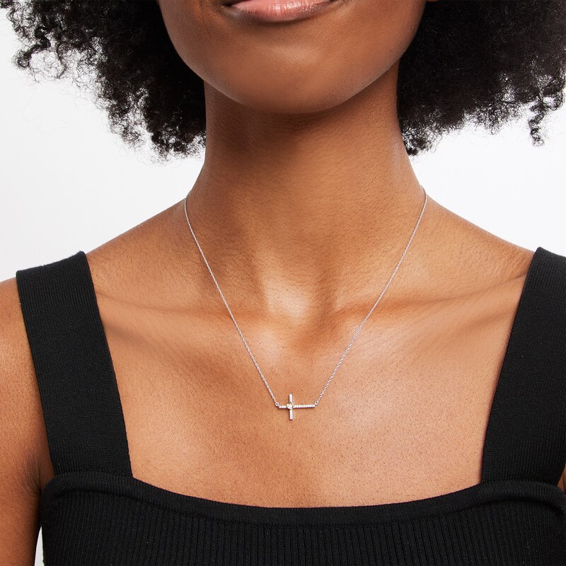 0.08 CT. T.W. Diamond Sideways Cross with Heart Necklace in Sterling Silver and 10K Gold|Peoples Jewellers