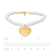 Thumbnail Image 4 of 5.5mm Oval Freshwater Cultured Pearl Strand Bracelet with 14K Gold Heart Charm-8"