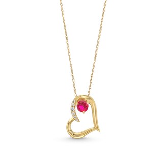 Lab-Created Ruby and 0.04 CT. T.W. Diamond Tilted Heart Pendant in 10K Gold
