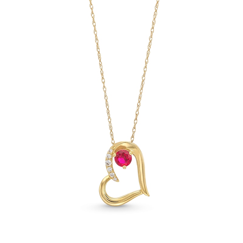 Lab-Created Ruby and 0.04 CT. T.W. Diamond Tilted Heart Pendant in 10K Gold|Peoples Jewellers