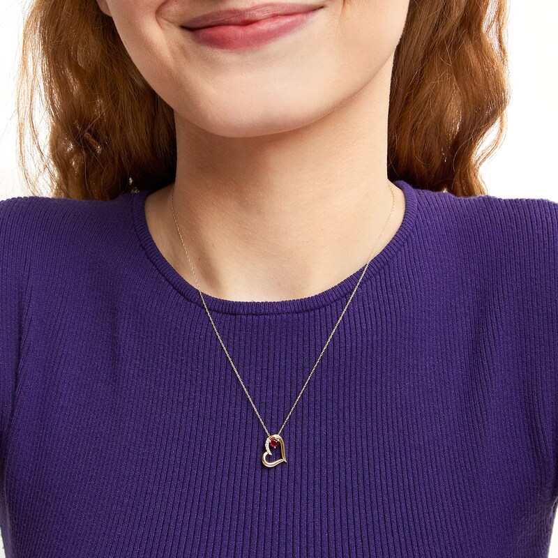 Lab-Created Ruby and 0.04 CT. T.W. Diamond Tilted Heart Pendant in 10K Gold|Peoples Jewellers