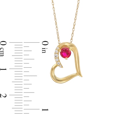 Lab-Created Ruby and 0.04 CT. T.W. Diamond Tilted Heart Pendant in 10K Gold