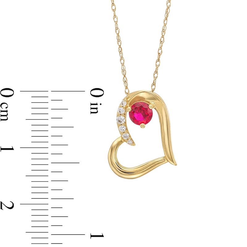 Lab-Created Ruby and 0.04 CT. T.W. Diamond Tilted Heart Pendant in 10K Gold