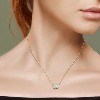 Sideways Oval Blue Opal and 0.08 CT. T.W. Diamond Twist Frame Necklace in 10K Gold - 17"