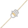 Thumbnail Image 1 of Marquise Opal and 0.20 CT. T.W. Diamond Sideways Hamsa Bracelet in 10K Gold - 7.75"