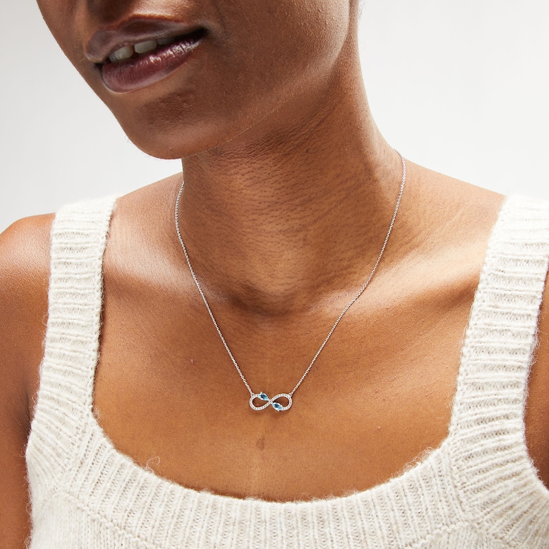 Main Image 2 of Pear-Shaped Swiss Blue Topaz and White Lab-Created Sapphire Infinity Necklace in Sterling Silver
