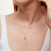Thumbnail Image 2 of Unstoppable Love™ 0.33 CT. T.W. Diamond Dangle Open Oval Frame Pendant in 10K White Gold