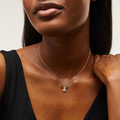 0.115 CT. T.W. Diamond Angel Pendant in Sterling Silver with 14K Gold Plate