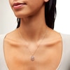 0.08 CT. T.W. Diamond Oval Frame Family Tree Pendant in Sterling Silver with 10K Gold Plate