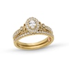 Thumbnail Image 1 of Perfect Fit 0.60 CT. T.W. Oval Certified Lab-Grown Diamond Heart-Sides Vintage-Style Bridal Set in 14K Gold (F/SI2)