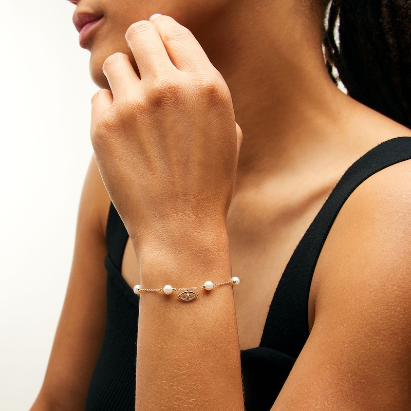 Main Image 2 of 5.0mm Freshwater Cultured Pearl with Evil Eye Station Chain Bracelet in 10K Gold-7.5"