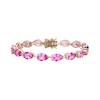 Thumbnail Image 1 of Pear-Shaped Pink Lab-Created Sapphire Tennis Bracelet in 10K Gold - 7.25"