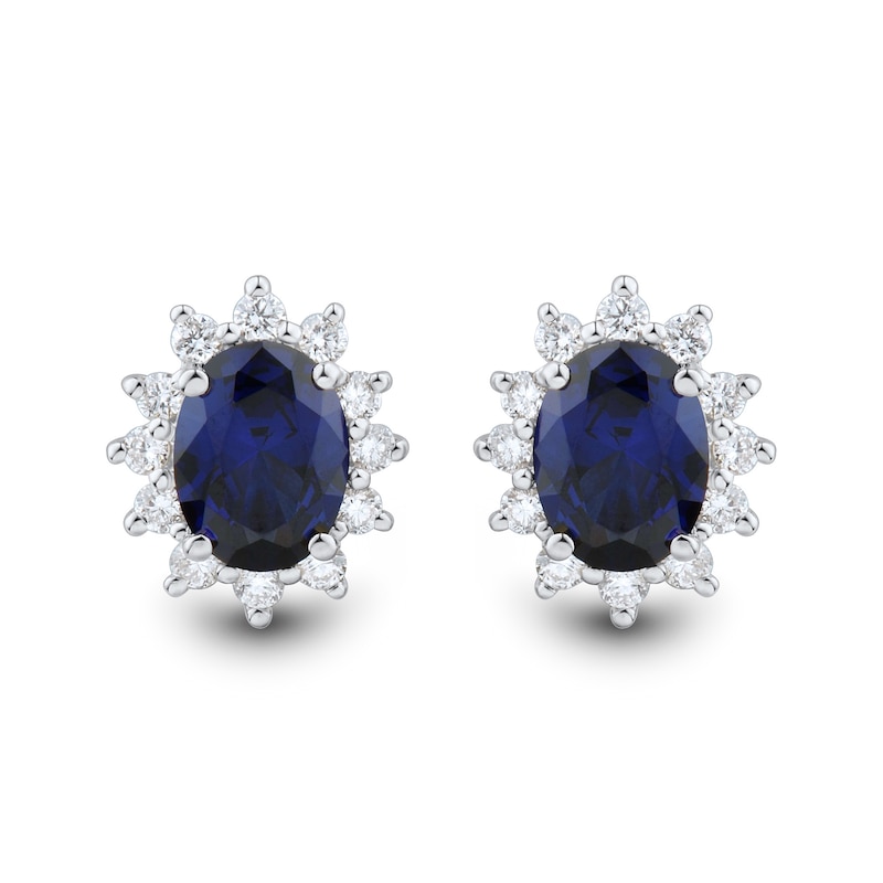 Oval Blue Lab-Created Sapphire and 0.45 CT. T.W. Certified Lab-Created Diamond Sunburst Stud Earrings in 10K White Gold