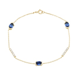 Oval Blue Lab-Created Sapphire and 0.18 CT. T.W. Certified Lab-Grown Diamond Station Bracelet in 10K Gold - 7.25”