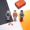 Thumbnail Image 3 of Men’s Citizen Eco-Drive® Brycen Weekender Super Titanium™ Watch with Orange Dial (Model: AW1840-50X)