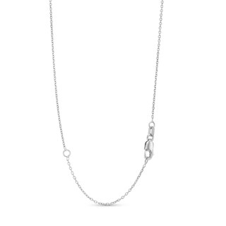 Pear-Shaped Lab-Created Emerald and White Lab-Created Sapphire Bow Pendant in Sterling Silver