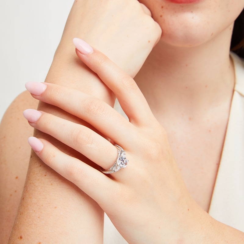 Previously Owned - 2.25 CT. T.W. Oval Certified Lab-Grown Diamond Sideways Three Stone Engagement Ring in 18K White Gold (F/VS2)
