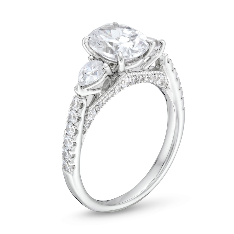 Previously Owned - 2.25 CT. T.W. Oval Certified Lab-Grown Diamond Sideways Three Stone Engagement Ring in 18K White Gold (F/VS2)