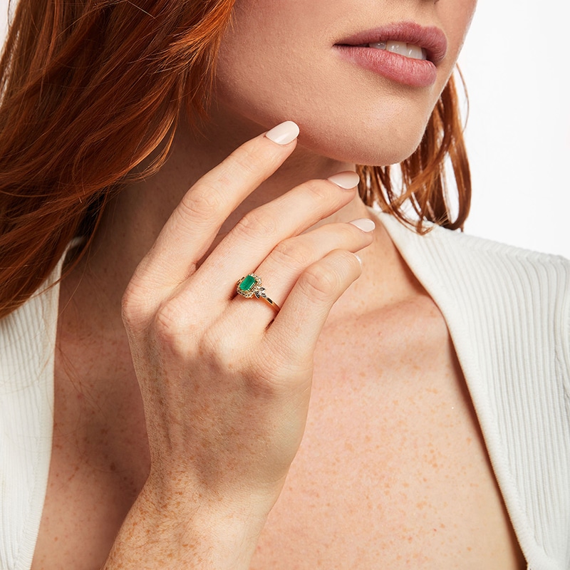 Previously Owned - Le Vian® Emerald-Cut Costa Smeralda Emerald™ and 0.20 CT. T.W. Diamond Leaves Ring in 14K Honey Gold™