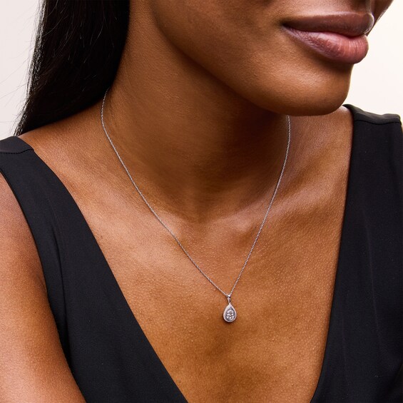 0.10 CT. T.W. Pear-Shaped Multi-Diamond Frame Pendant in Sterling Silver