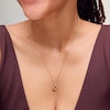 0.05 CT. T.W. Diamond Twist Teardrop Pendant in Sterling Silver with 10K Gold Plate