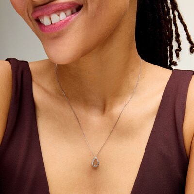 0.05 CT. T.W. Diamond Open Teardrop Pendant in Sterling Silver