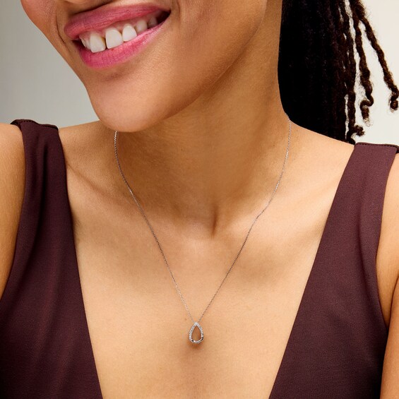 0.05 CT. T.W. Diamond Open Teardrop Pendant in Sterling Silver