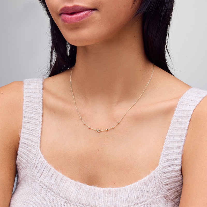 Main Image 2 of Infinity and Diamond-Cut Bead Station Necklace in 10K Gold