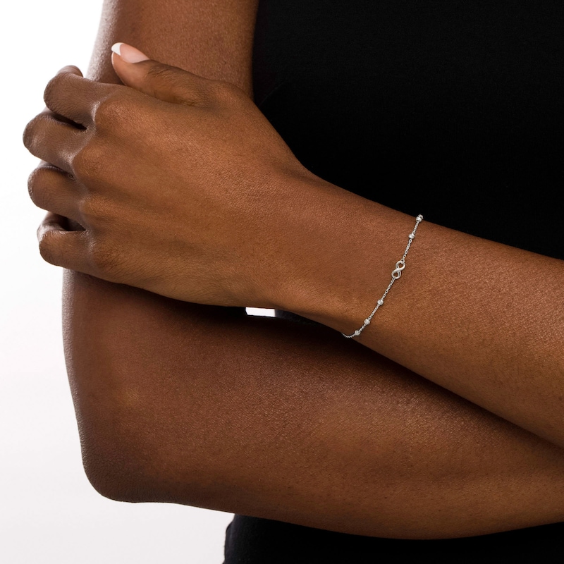 Main Image 2 of Infinity and Diamond-Cut Bead Station Bracelet in 10K White Gold - 7.5”