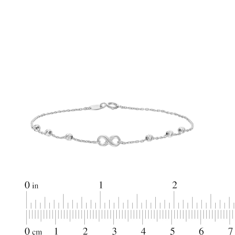 Main Image 4 of Infinity and Diamond-Cut Bead Station Bracelet in 10K White Gold - 7.5”