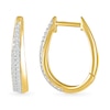 0.23 CT. T.W. Diamond Oval Hoop Earrings in 10K Gold
