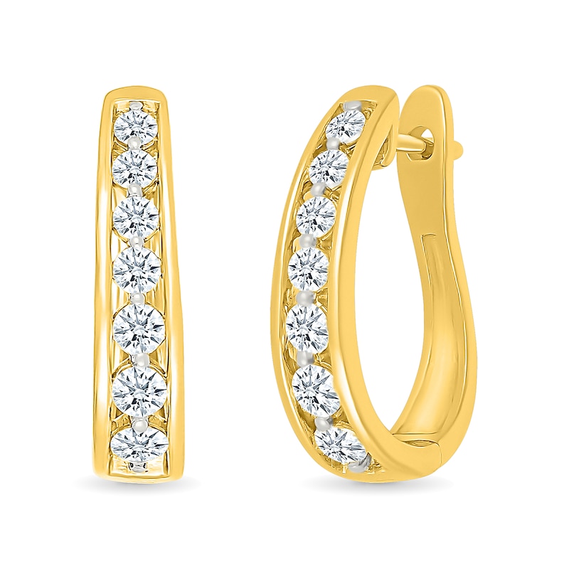 0.95 CT. T.W. Diamond Graduated Oval Hoop Earrings in 10K Gold