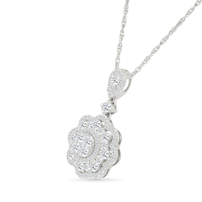 0.95 CT. T.W. Diamond Flower Pendant in 10K White Gold