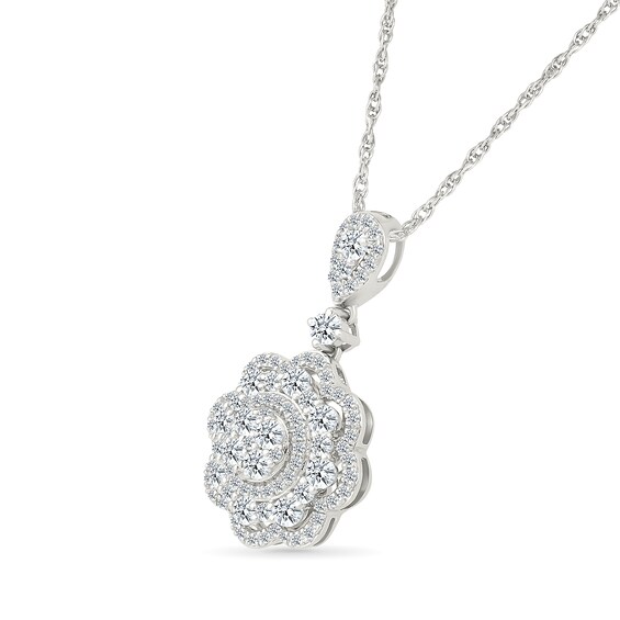 0.95 CT. T.W. Diamond Flower Pendant in 10K White Gold