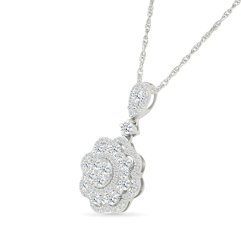 0.95 CT. T.W. Diamond Flower Pendant in 10K White Gold