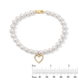 6.0-7.0mm Freshwater Cultured Pearl and 0.085 CT. T.W. Diamond Heart Charm Bracelet in 10K Gold - 8”
