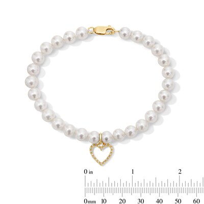 6.0-7.0mm Freshwater Cultured Pearl and 0.085 CT. T.W. Diamond Heart Charm Bracelet in 10K Gold - 8”