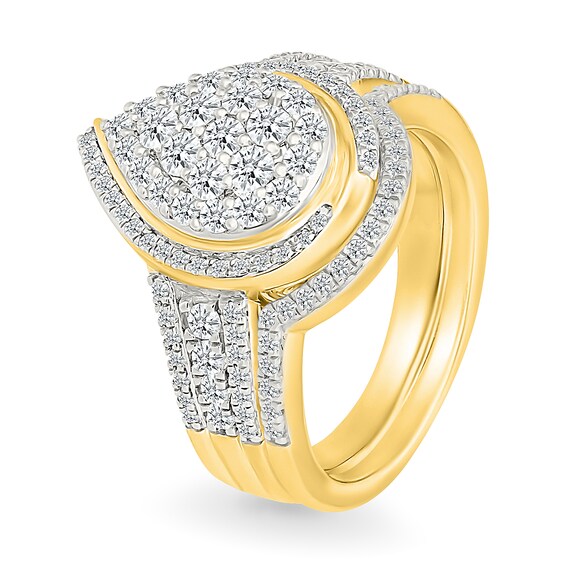 0.95 CT. T.W. Pear-Shaped Multi-Diamond Swirl Frame Triple Row Bridal Set in 10K Gold