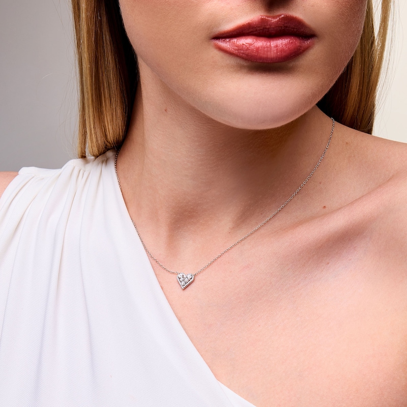 0.085 CT. T.W. Heart-Shaped Multi-Diamond Frame Necklace in Sterling Silver