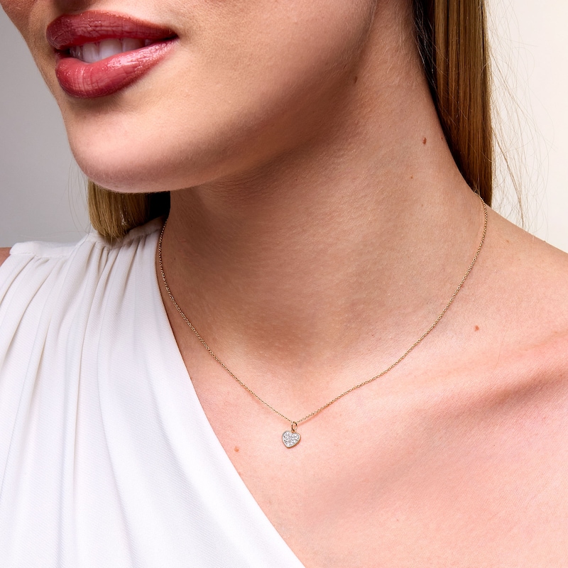 0.04 CT. T.W. Heart-Shaped Multi-Diamond Motherly Love Double Charm Pendant in 10K Gold