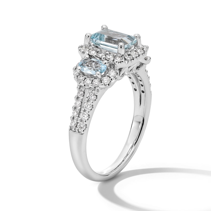Main Image 2 of Emerald-Cut and Oval Aquamarine with 0.45 CT. T.W. Diamond Frame Three Stone Ring in 10K White Gold