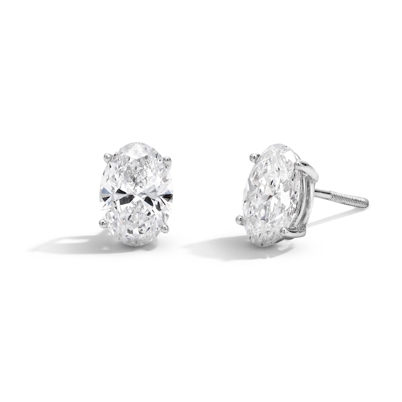 CT. T.W. Oval Certified Lab-Created Diamond Solitaire Stud Earrings in 14K White Gold (F/SI2