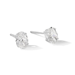 1.00 CT. T.W. Oval Certified Lab-Grown Diamond Solitaire Stud Earrings in 14K White Gold (F/SI2)