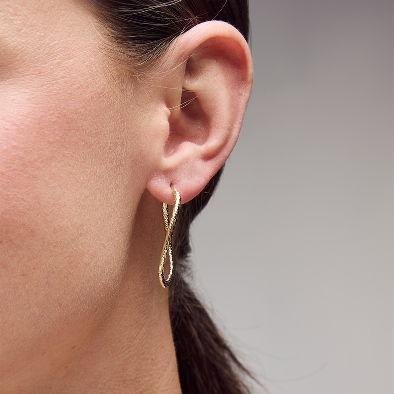 40.0mm Diamond-Cut Twist Oval Hoop Earrings in Hollow 18K Gold
